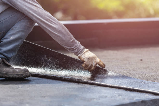 Professional Waterproofing technician working in Annapolis, MD